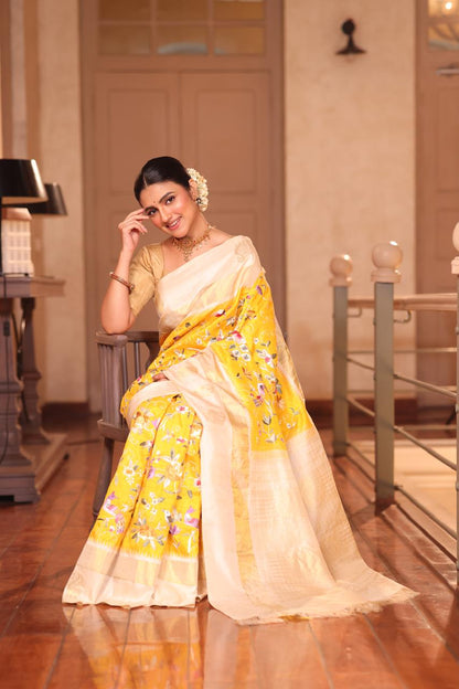 A pastel yellow Masterpiece kanchivaram weave silk saree with authentic Parsi gara work