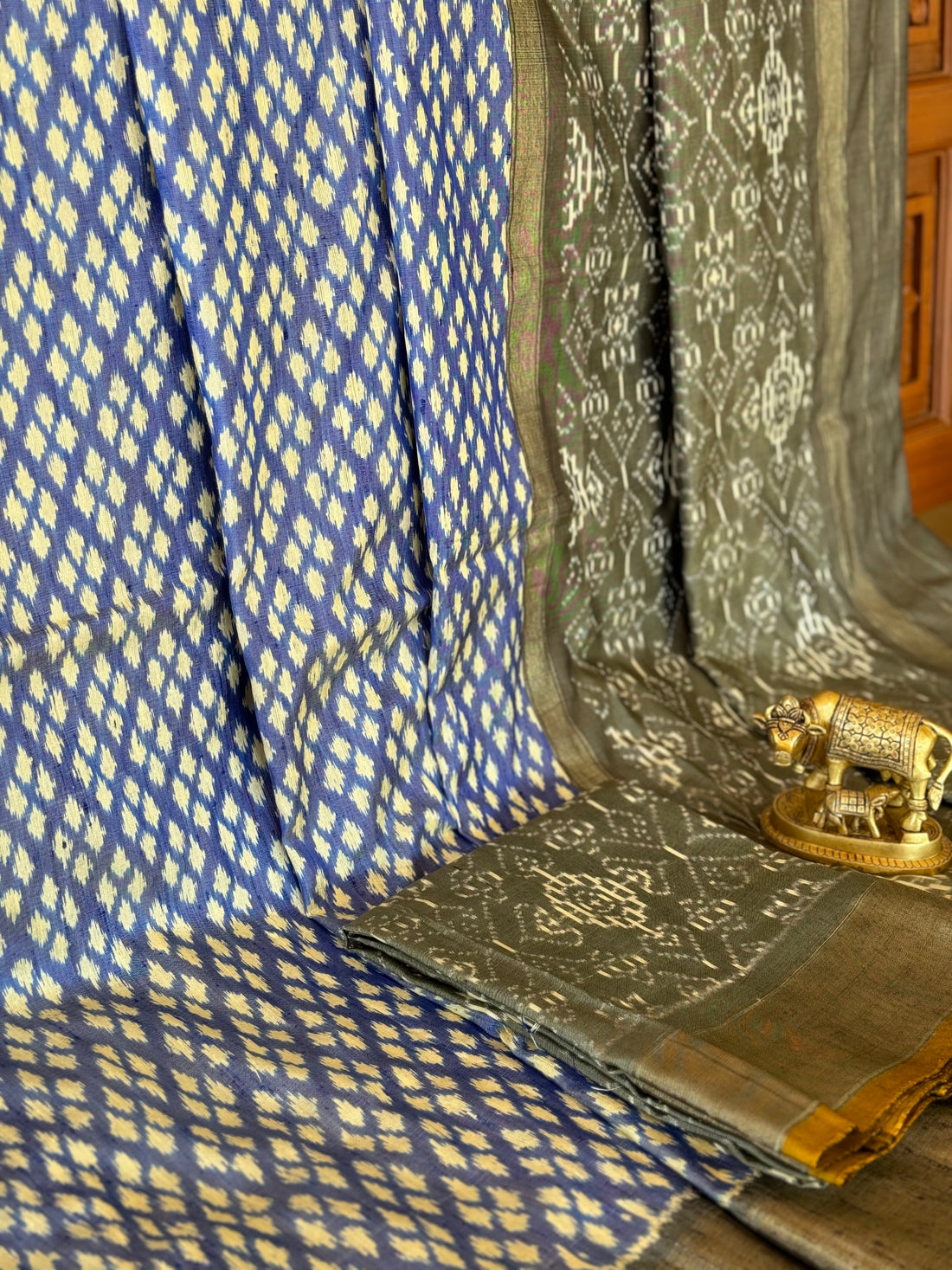 Handwoven tie dyed powder blue with grey contemporary polka dots raw silk ikkat saree