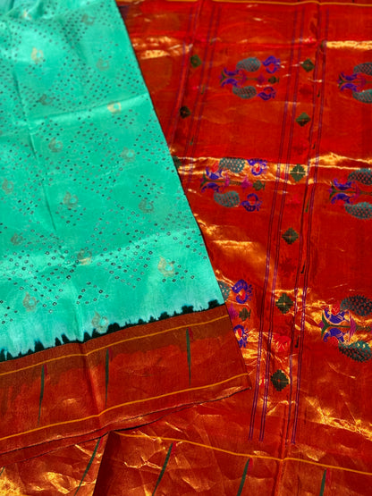 Seagreen Paithani Silk With Bandhej Tie And Dye Muniya Border Saree