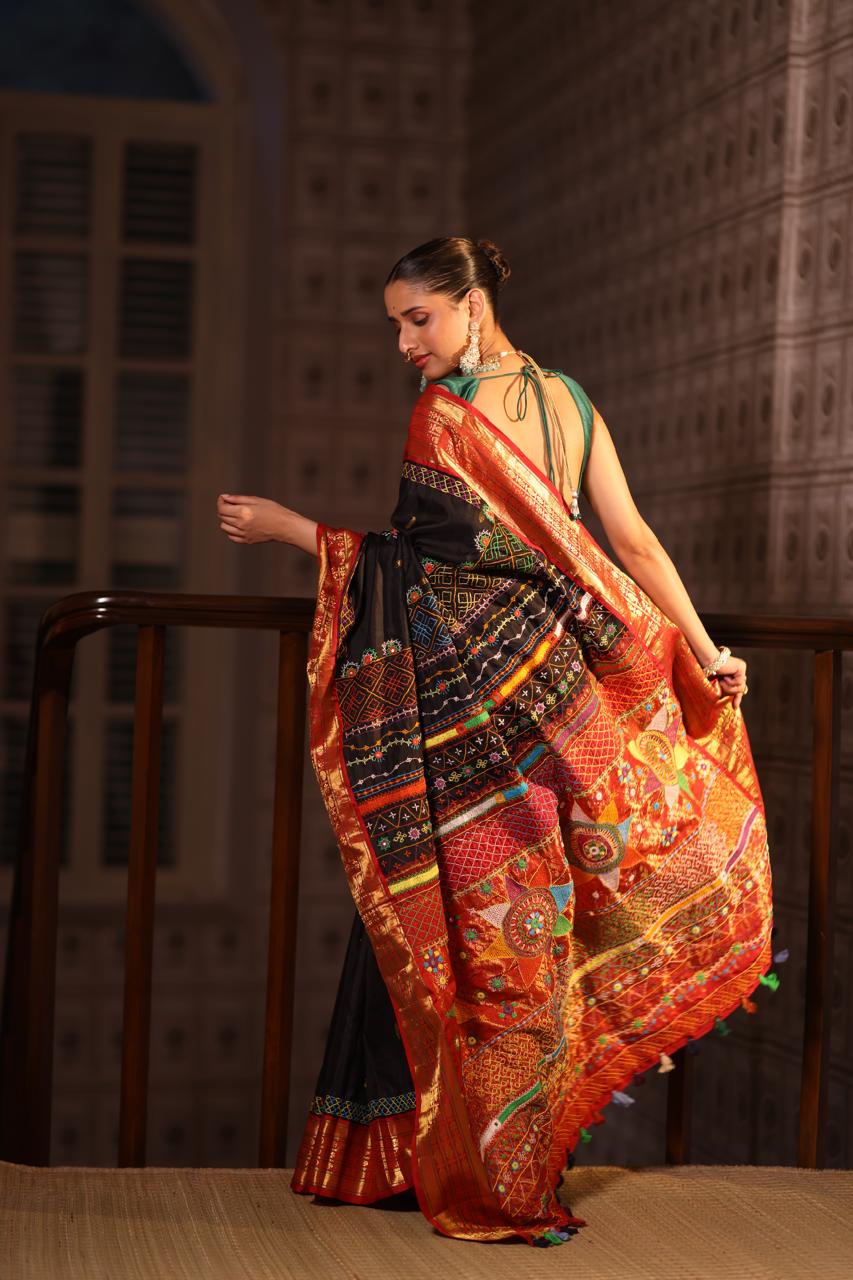 Lambani embroidery with mirror work crafted on pure korvai kanchivaram silk