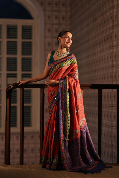 Block prints and kutch mirrorwork highlights on zari woven tussar silk saree
