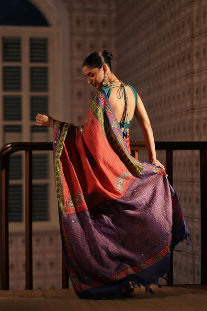 Block prints and kutch mirrorwork highlights on zari woven tussar silk saree