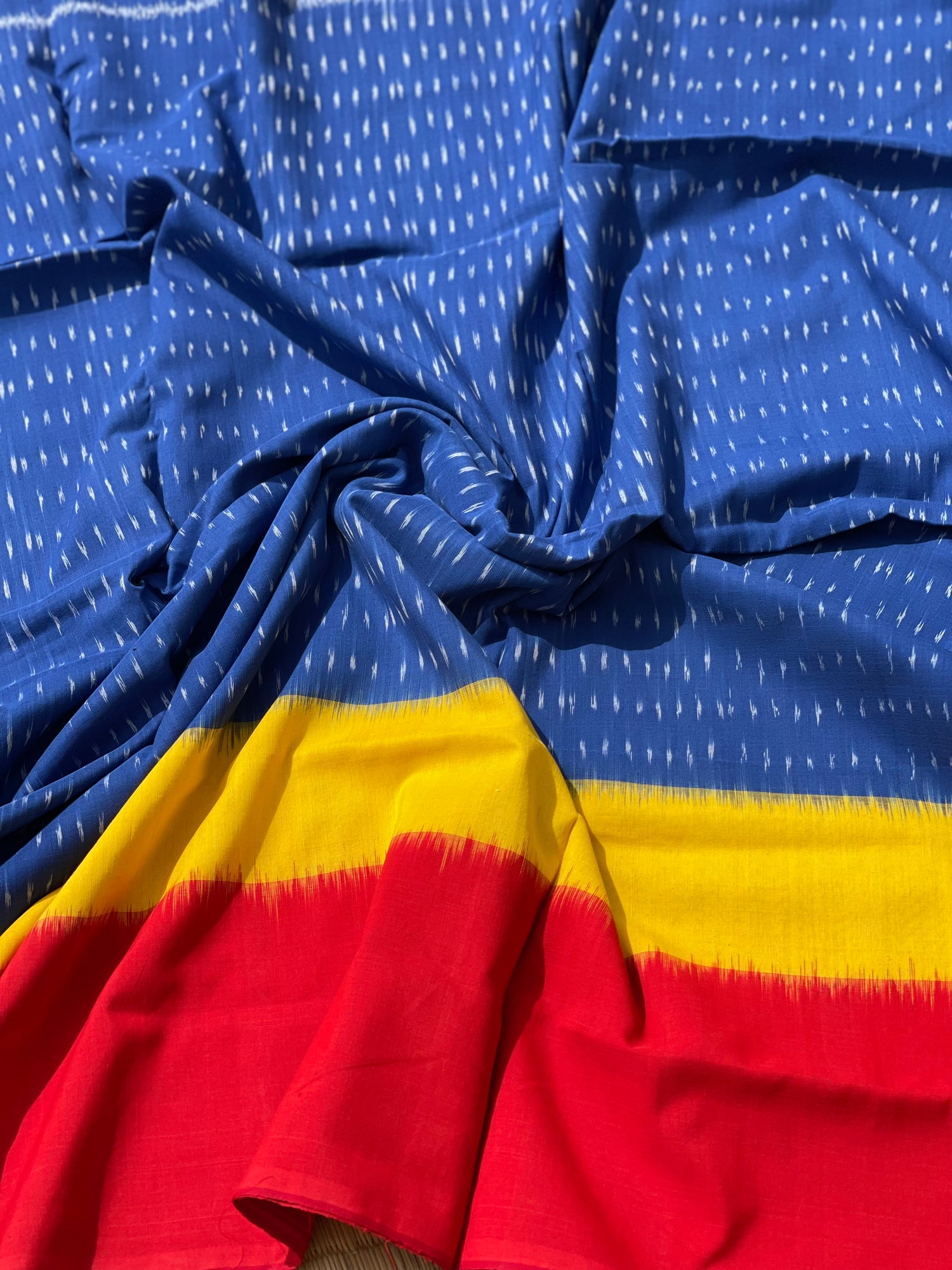 Beautiful weft ikkat cotton Saree with in yellow red and blue