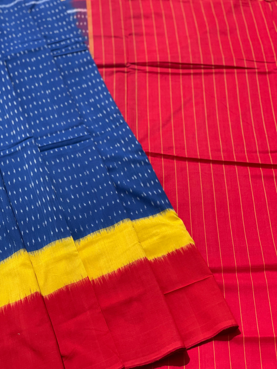 Beautiful weft ikkat cotton Saree with in yellow red and blue