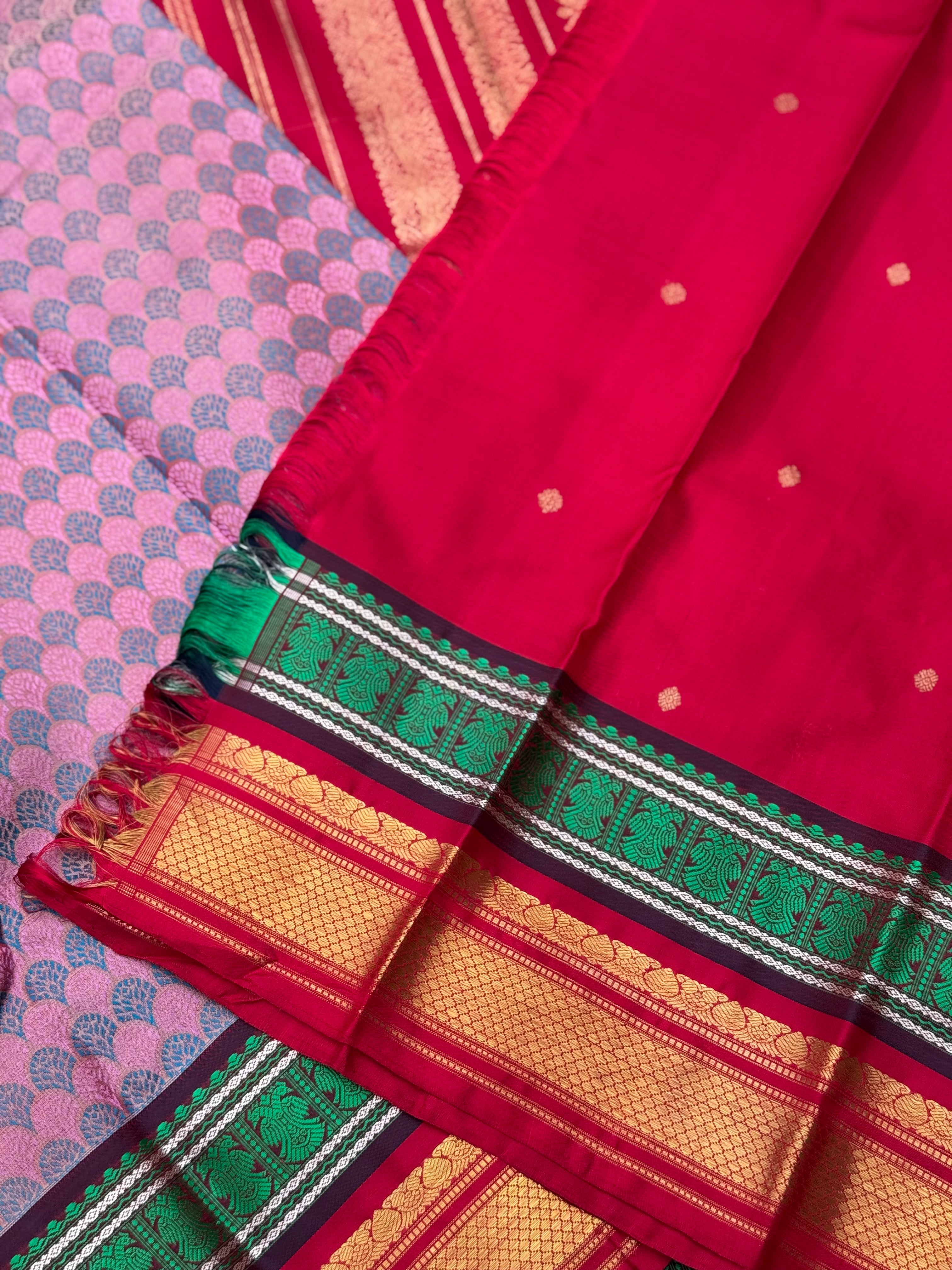 A stunner Masterpiece double border  kanchivaram woven silk saree in mauve pink green red