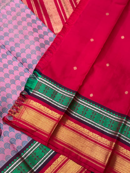 A stunner Masterpiece double border  kanchivaram woven silk saree in mauve pink green red