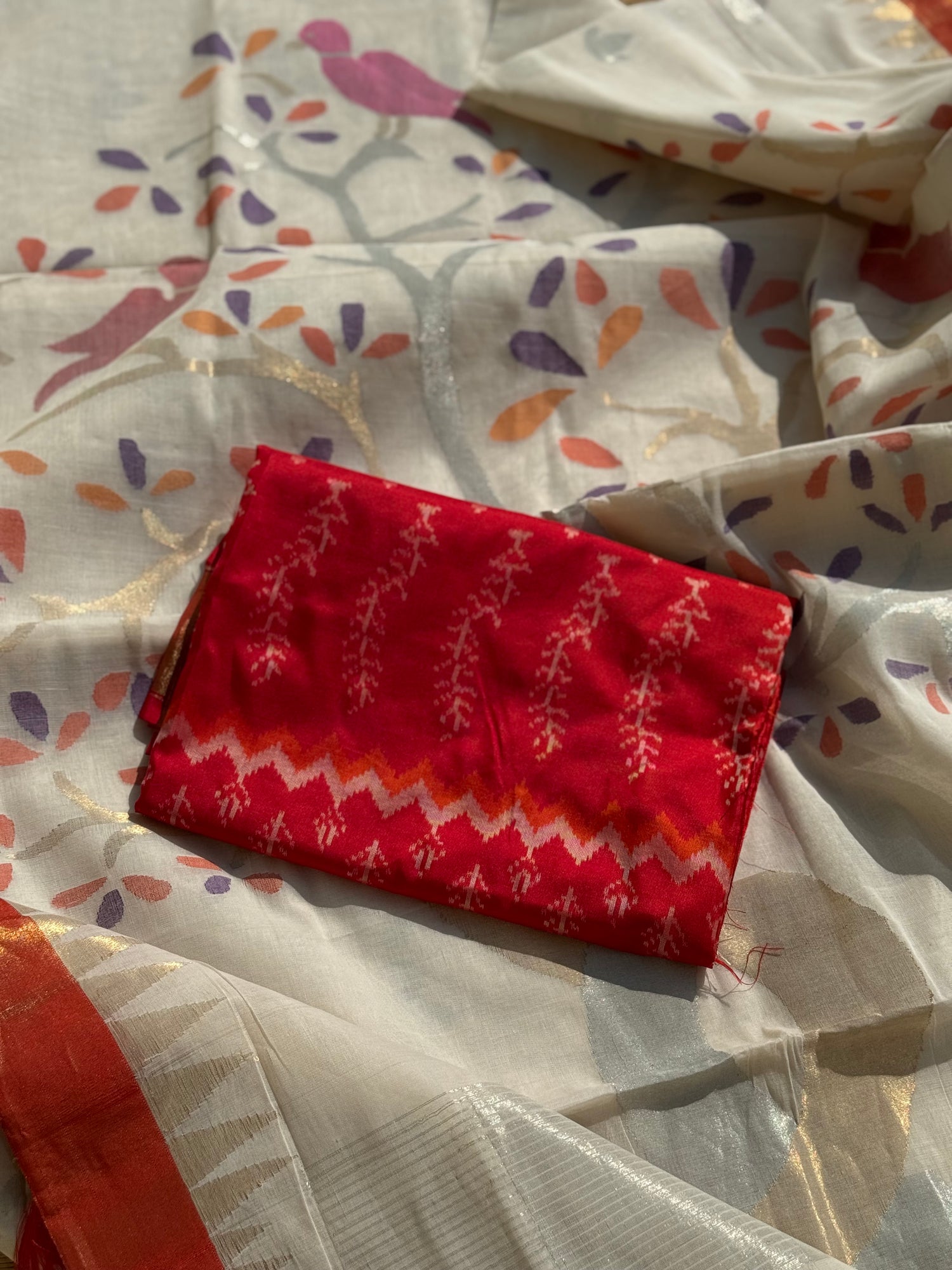 Handspun Ponduru Khadhi Jaal Jamdani Saree in pristine white with silver