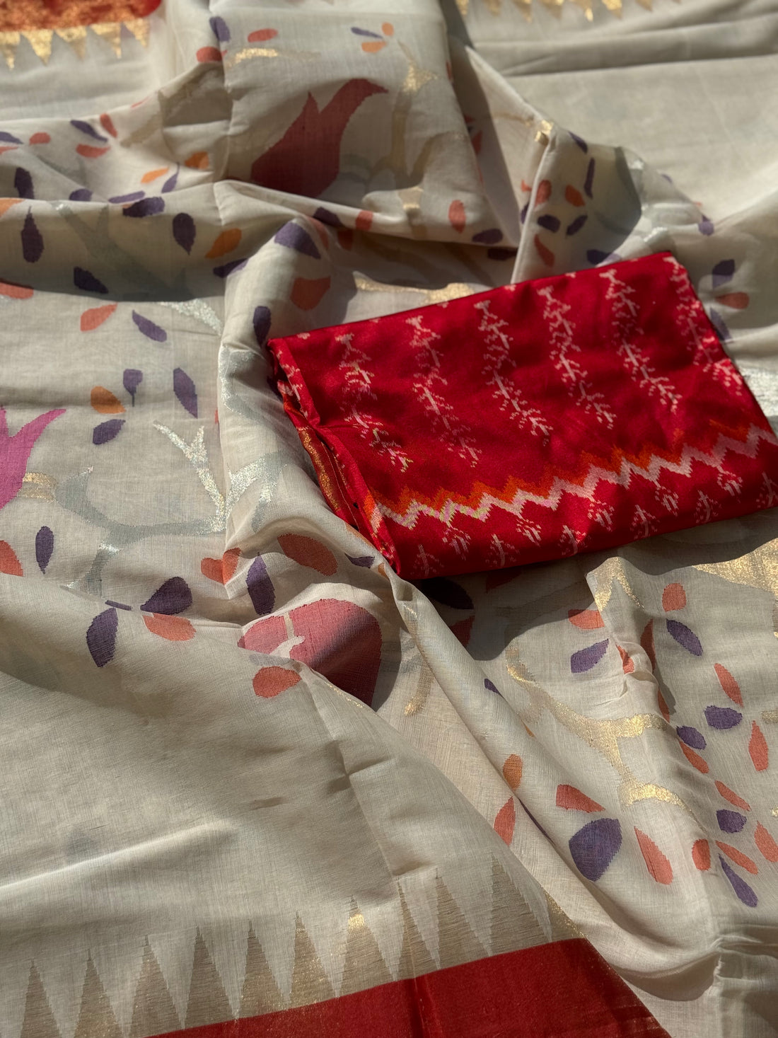 Handspun Ponduru Khadhi Jaal Jamdani Saree in pristine white with silver