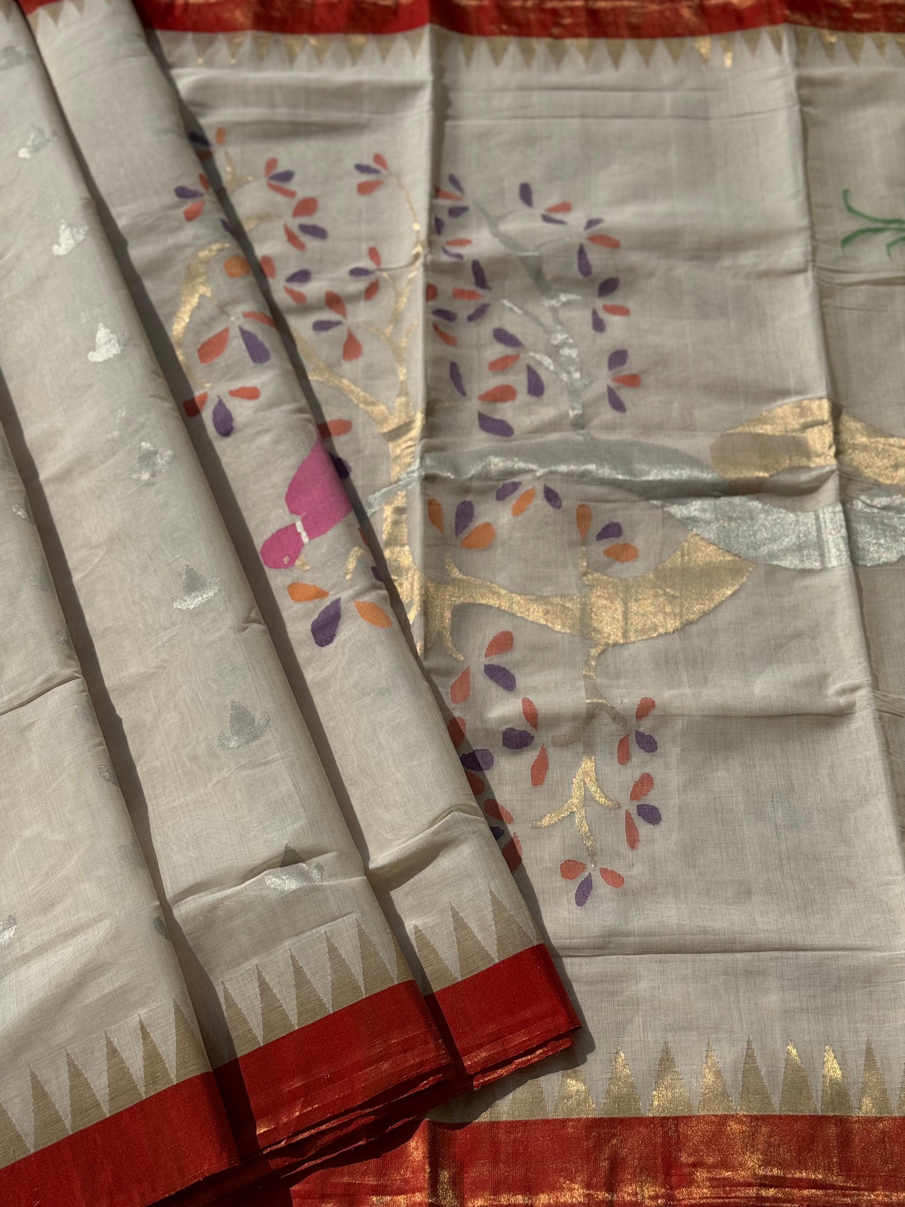 Handspun Ponduru Khadhi Jaal Jamdani Saree in pristine white with silver