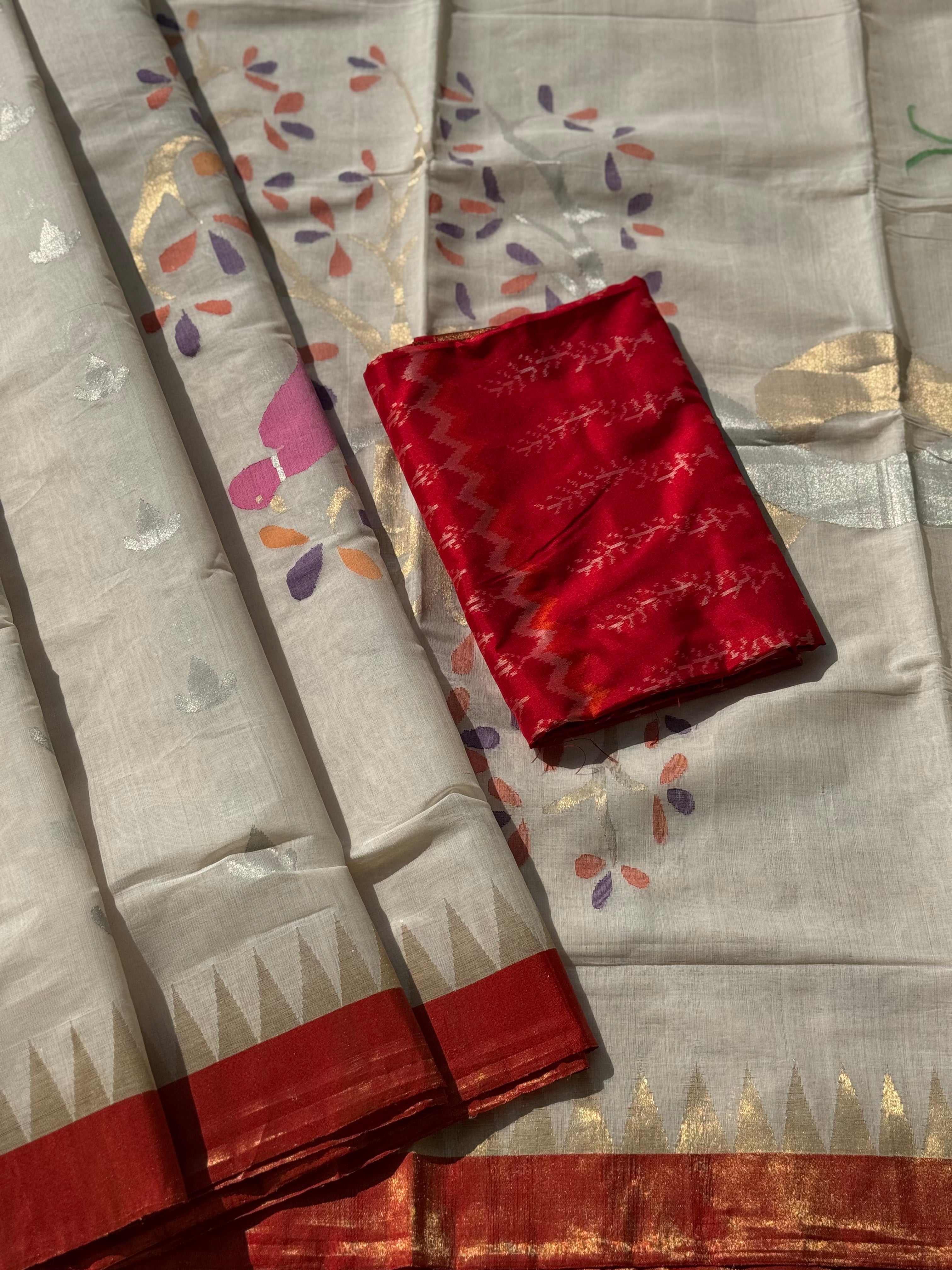 Handspun Ponduru Khadhi Jaal Jamdani Saree in pristine white with silver