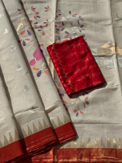 Handspun Ponduru Khadhi Jaal Jamdani Saree in pristine white with silver