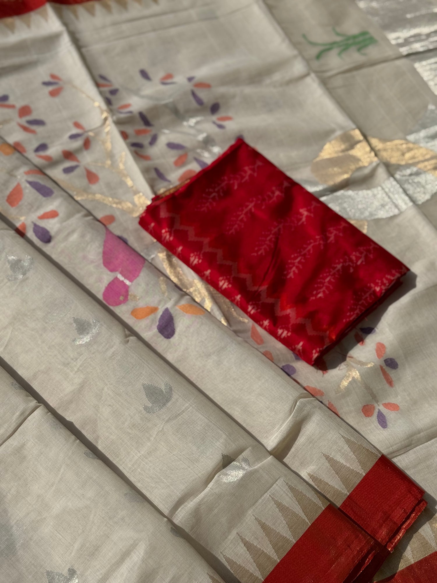 Handspun Ponduru Khadhi Jaal Jamdani Saree in pristine white with silver