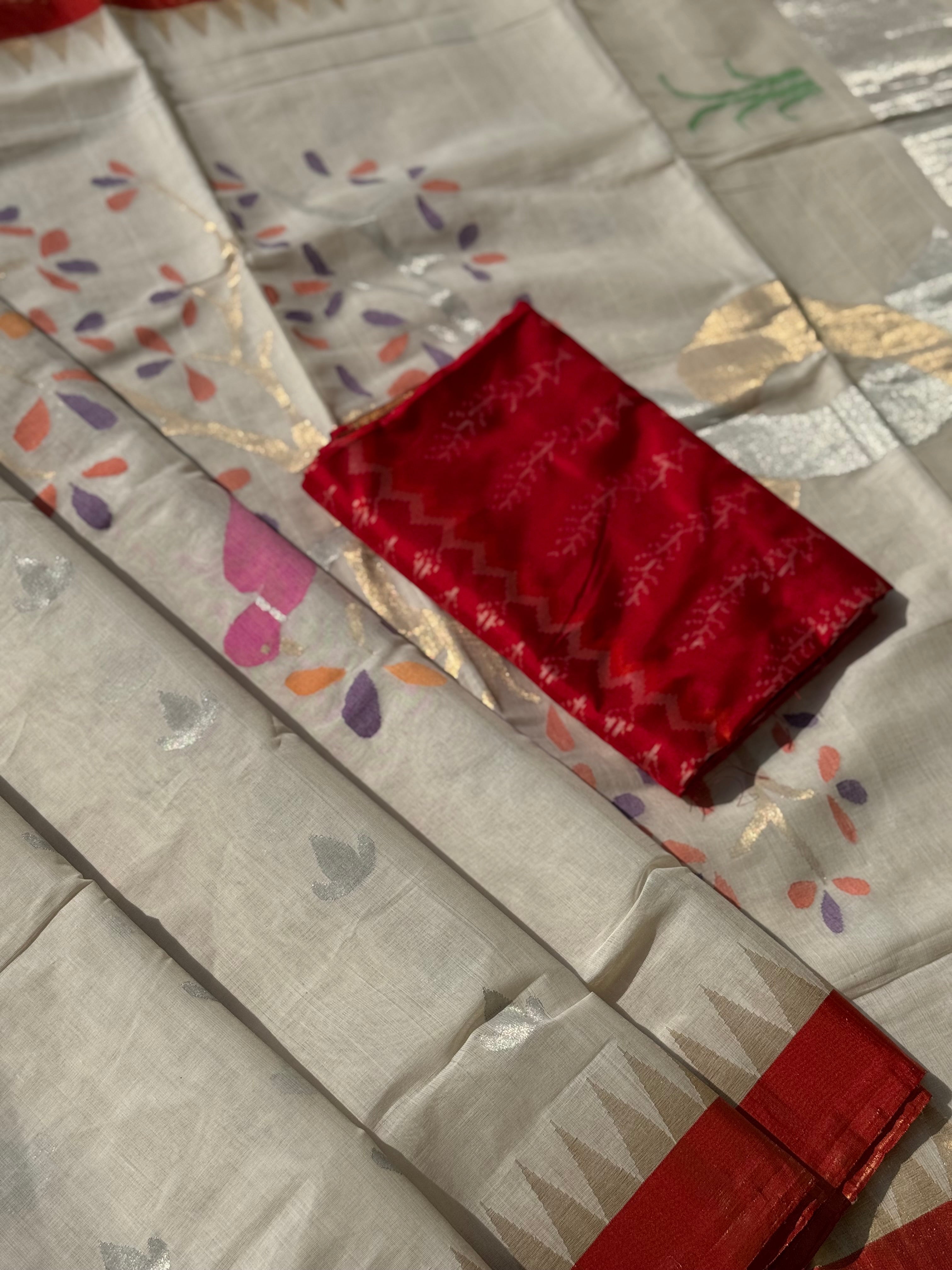 Handspun Ponduru Khadhi Jaal Jamdani Saree in pristine white with silver