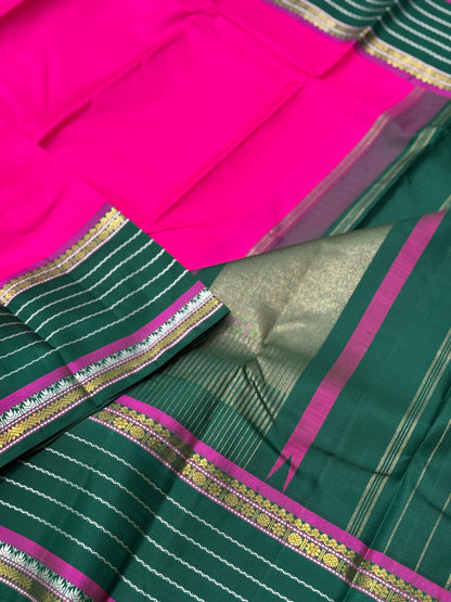 The masterfully crafted neli veldhari Kanchivaram silk saree features subtle pattu rose pink