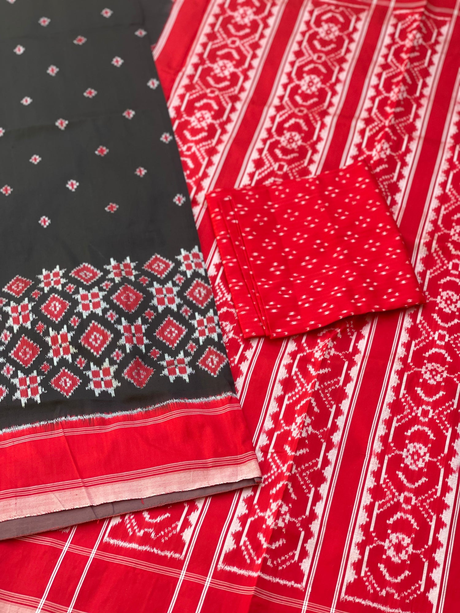 A Contemporary in Telia Rumal Inspired silk ikkat saree in black and red