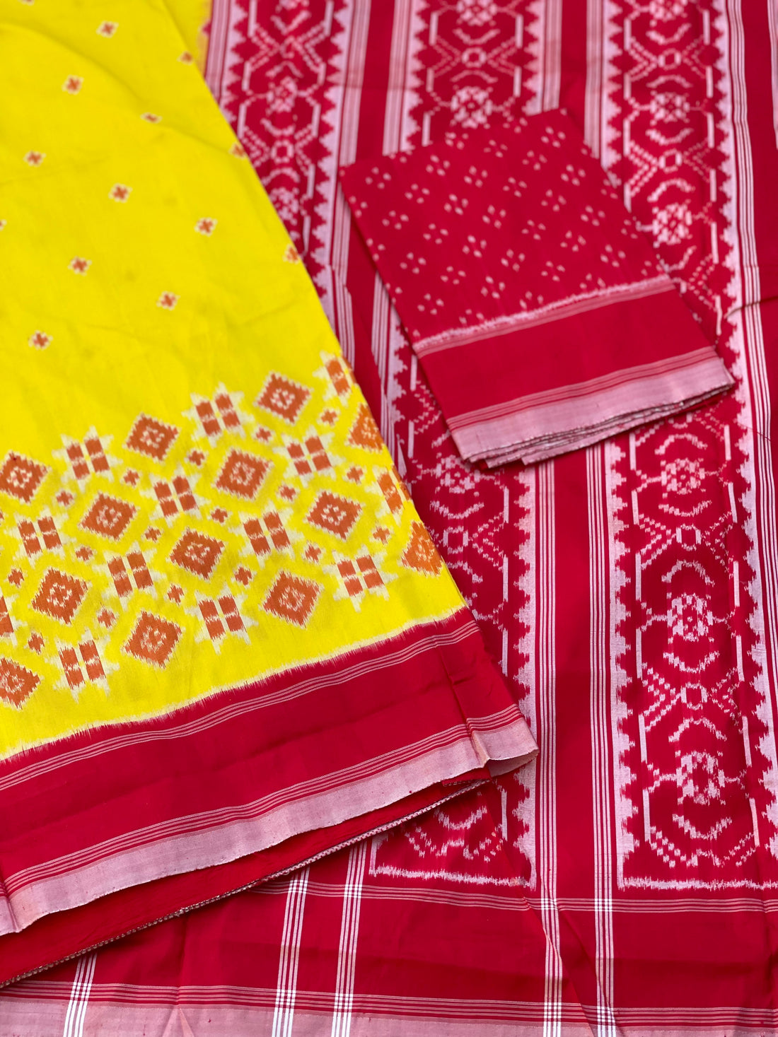 A Contemporary in Telia Rumal Inspired silk ikkat saree in yellow red