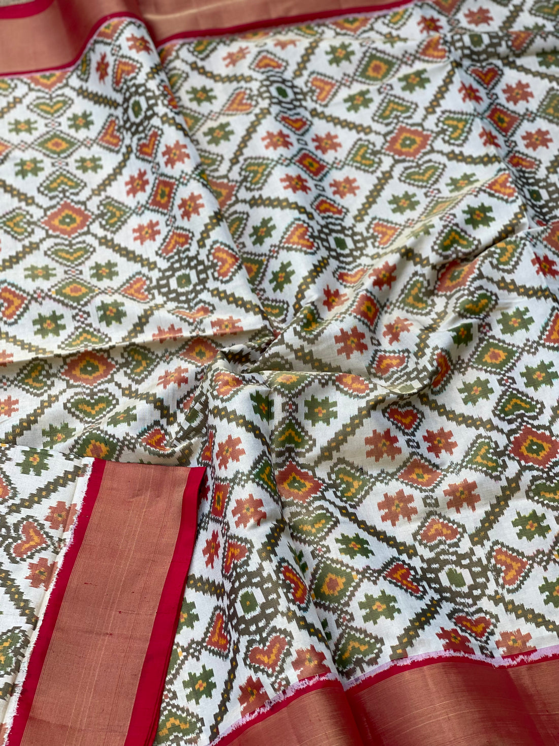 Tissue Patola inspired woven single ikkat silk saree