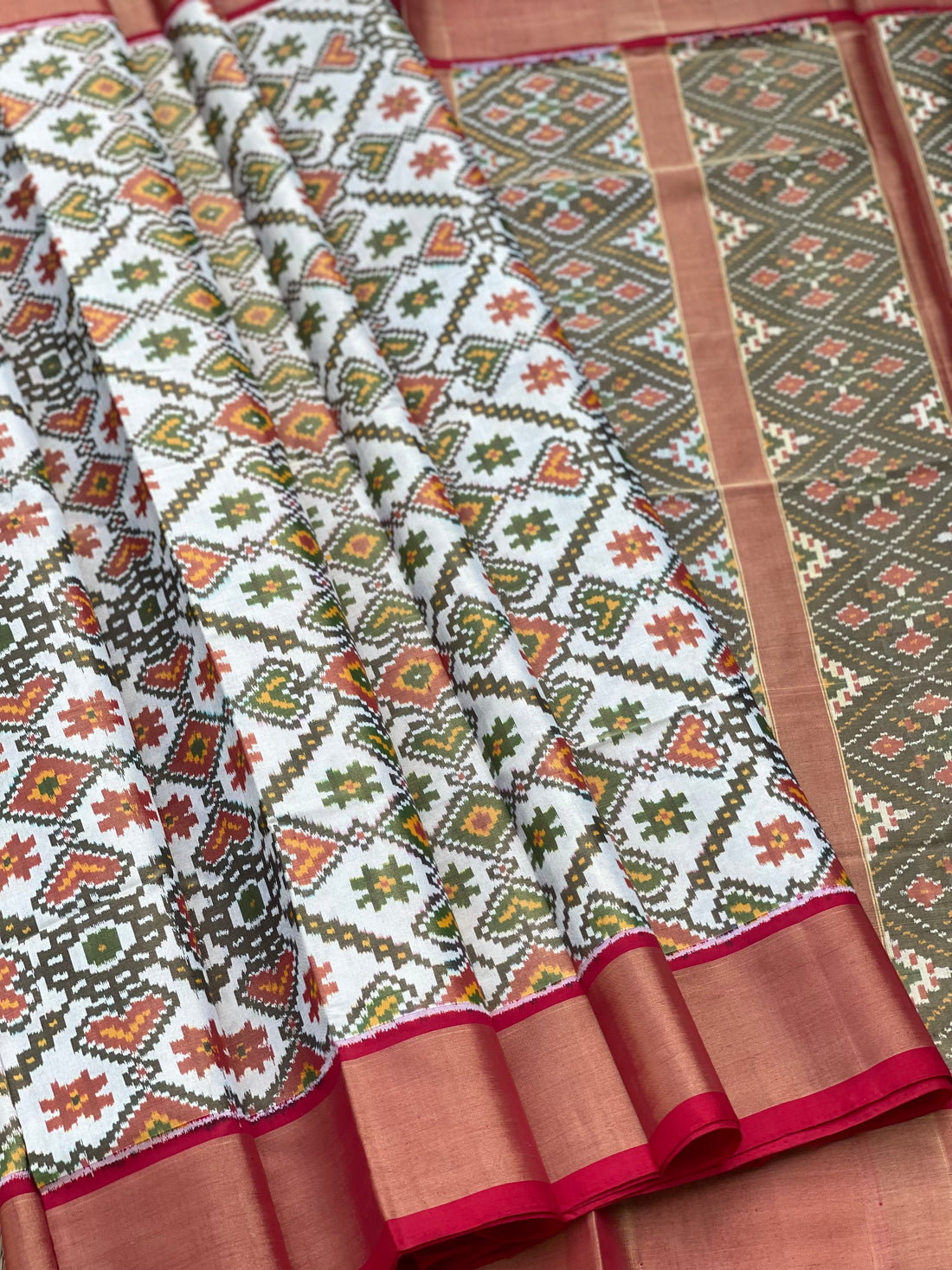 Tissue Patola inspired woven single ikkat silk saree