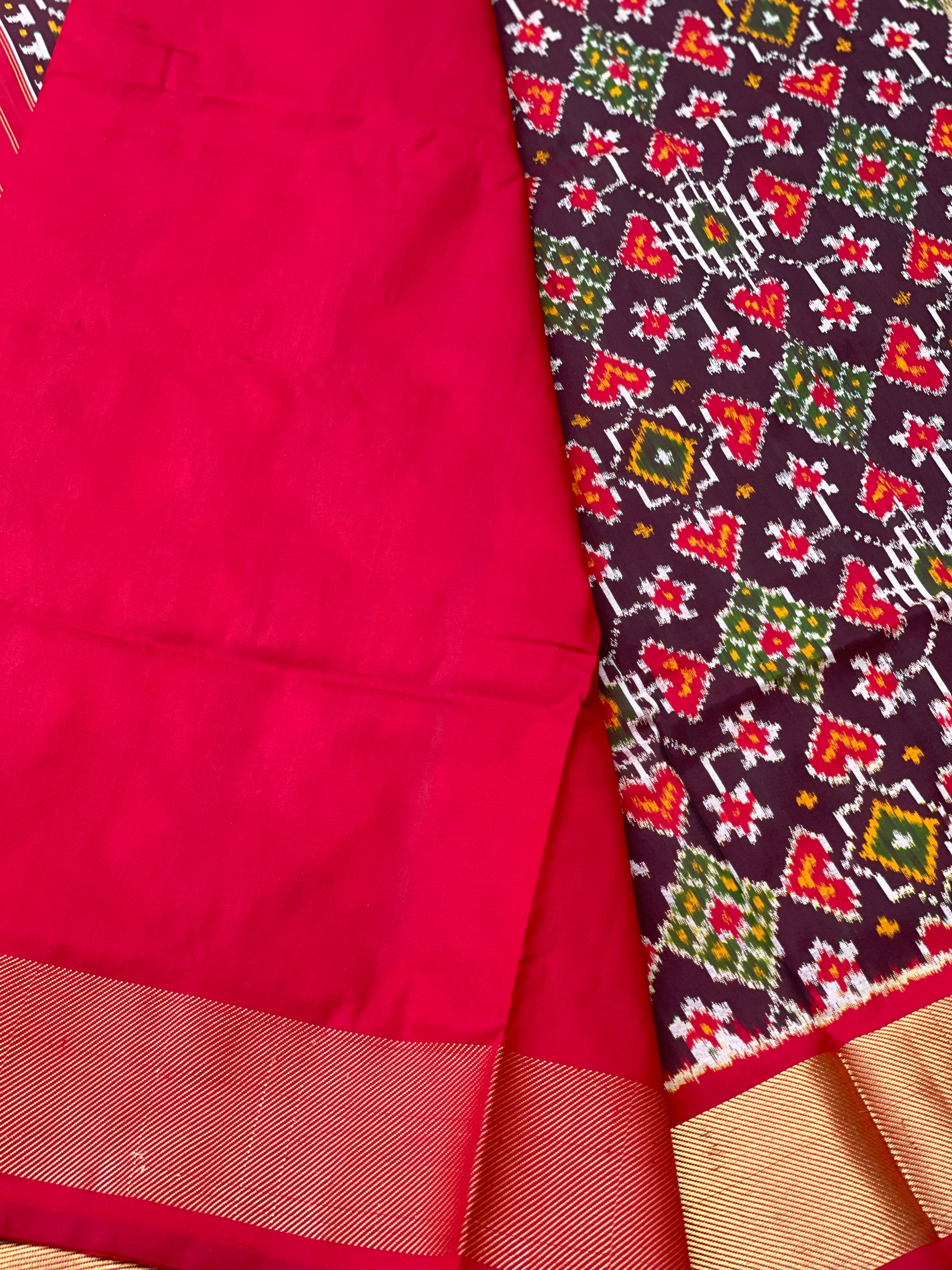 A Traditional Patola inspired silk ikkat saree with navrathan motifs