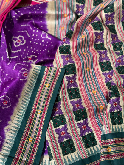 An exquisite handwoven vidharbha tussar silk saree with karvati kinar border intricately tie dyed with brinjal purple blue bhandhej and phulkari hand embroidered