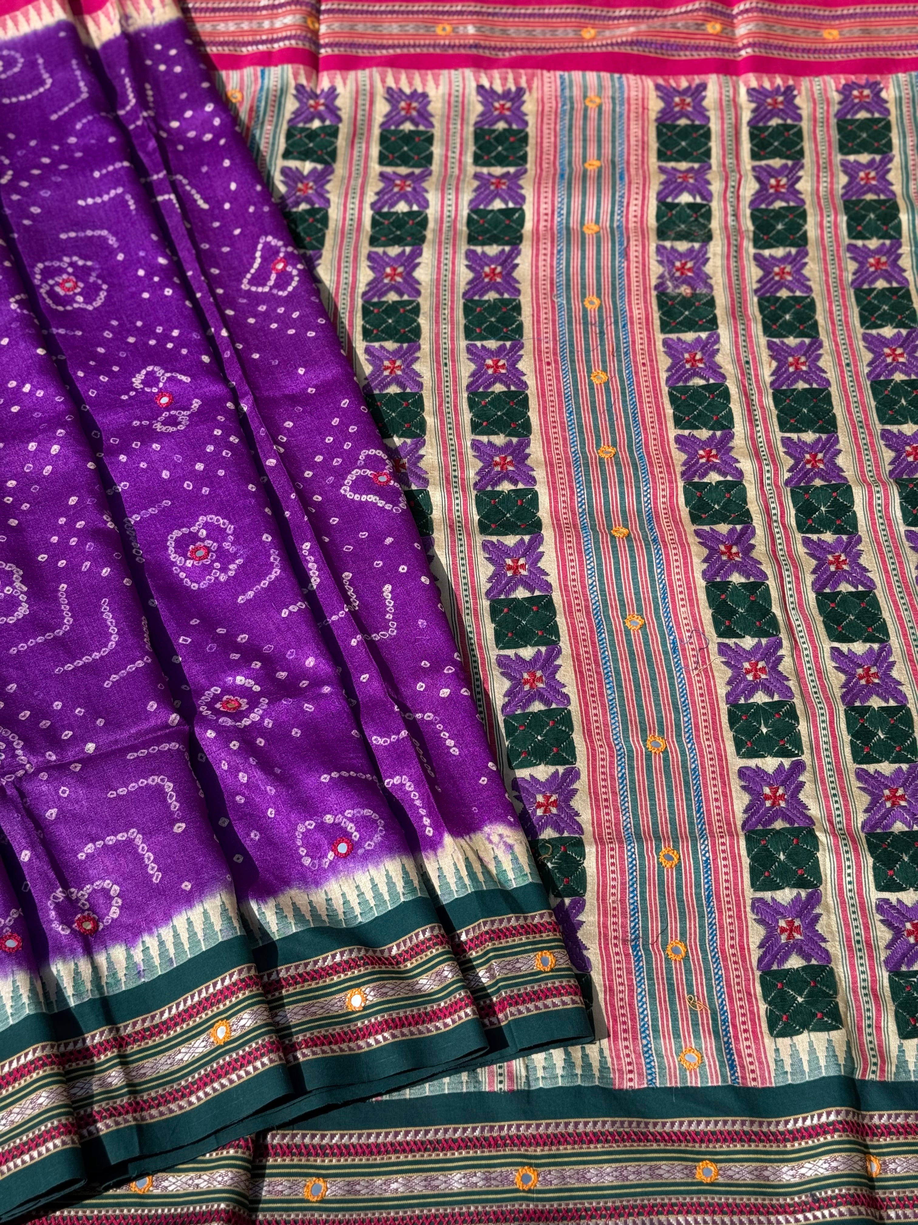 An exquisite handwoven vidharbha tussar silk saree with karvati kinar border intricately tie dyed with brinjal purple blue bhandhej and phulkari hand embroidered