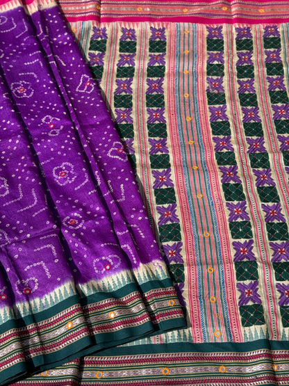 An exquisite handwoven vidharbha tussar silk saree with karvati kinar border intricately tie dyed with brinjal purple blue bhandhej and phulkari hand embroidered