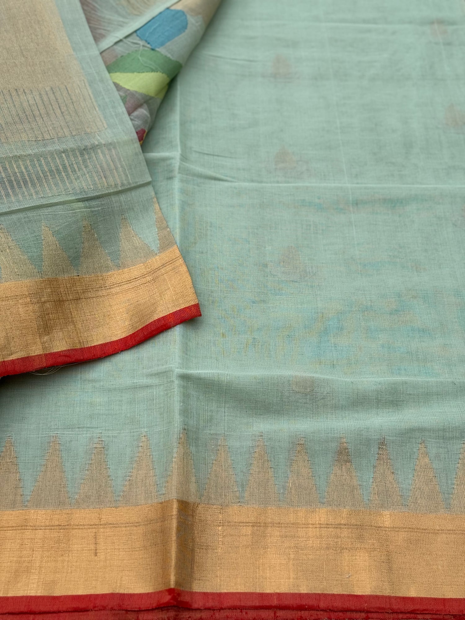 A gorgeous pastel mint shade handspun ponduru Khadhi jamdani cotton saree