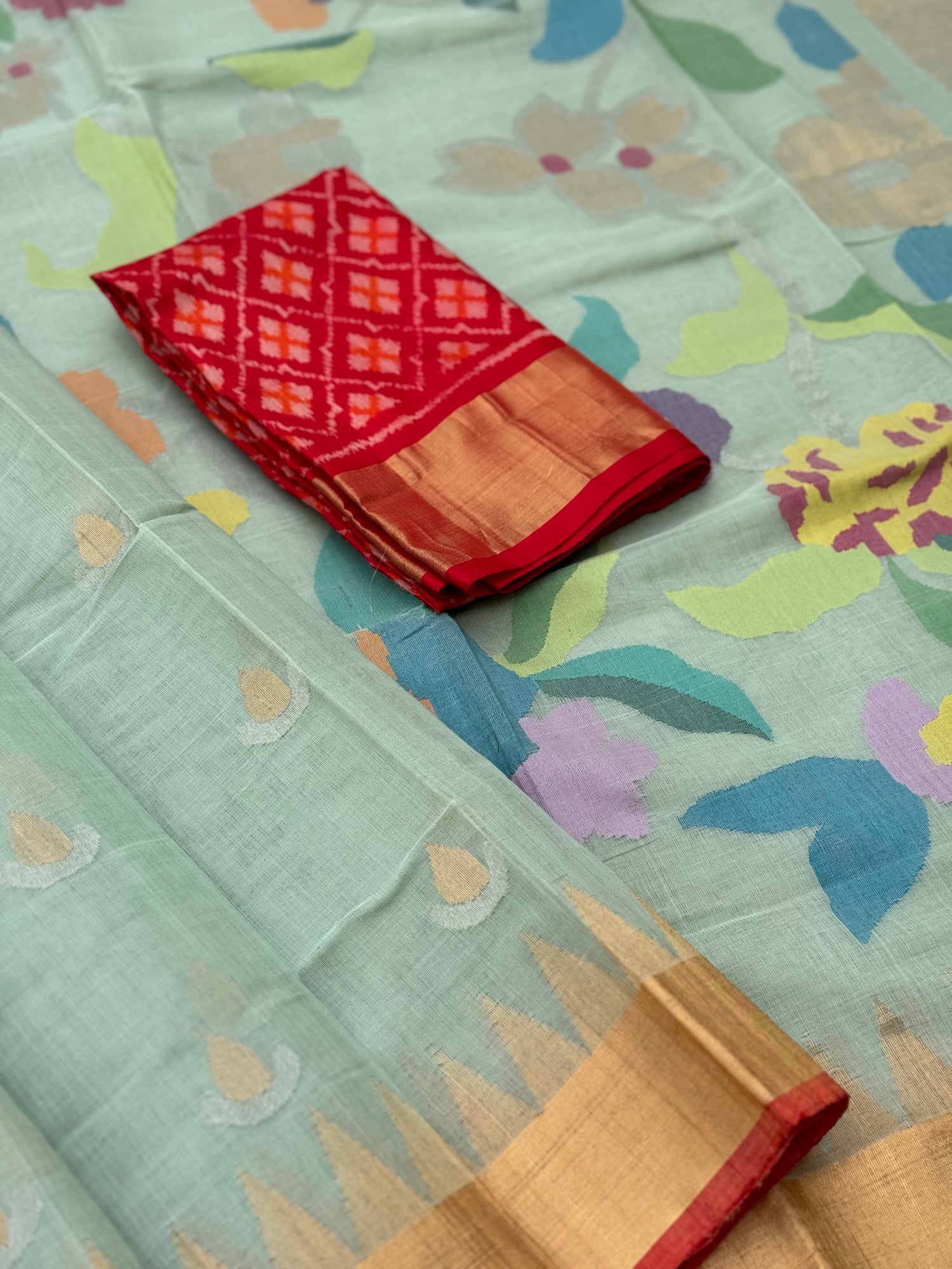 A gorgeous pastel mint shade handspun ponduru Khadhi jamdani cotton saree