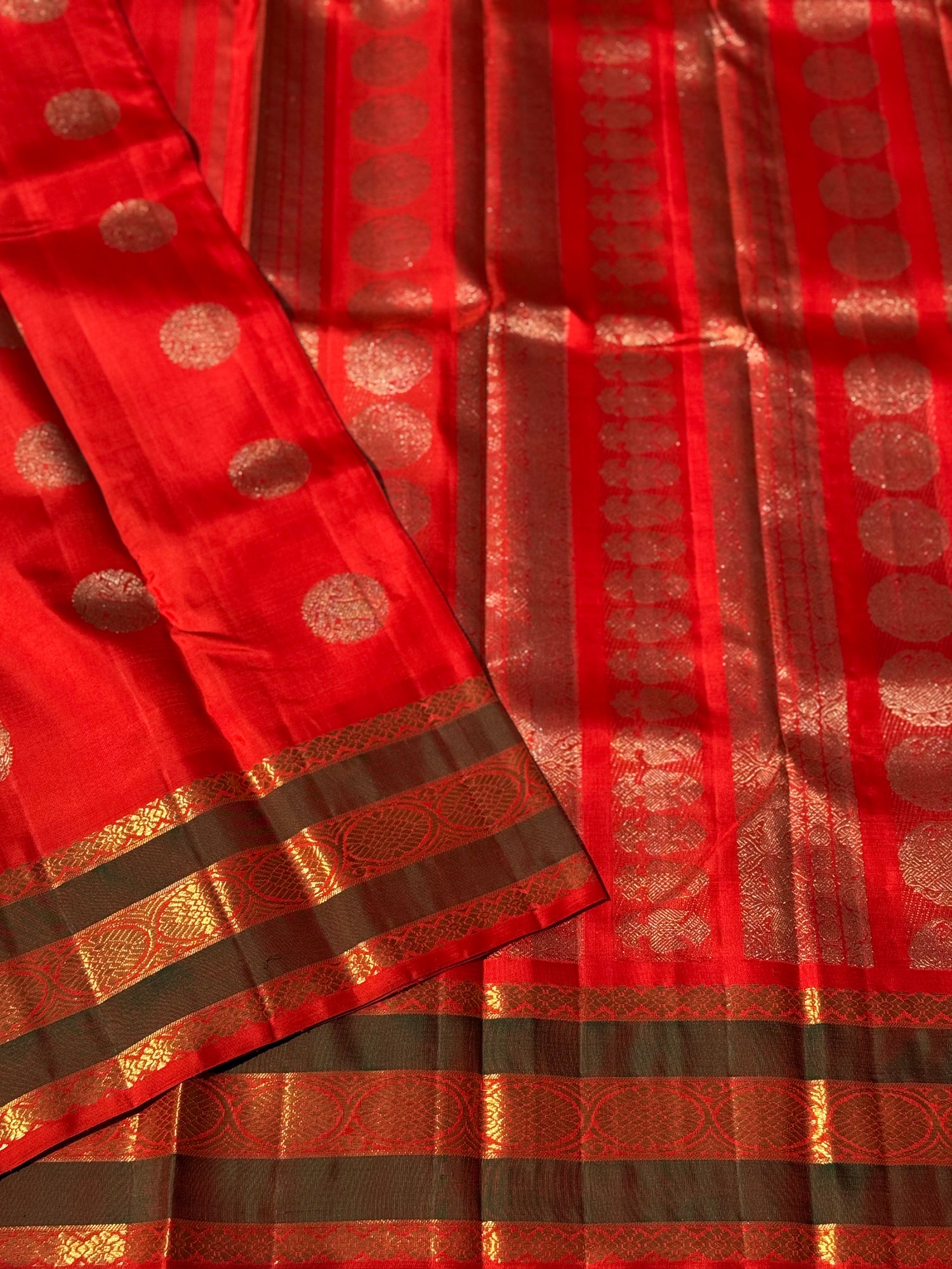 An exquisite zari woven bridal red kanchivaram masterpiece