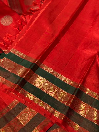 An exquisite zari woven bridal red kanchivaram masterpiece