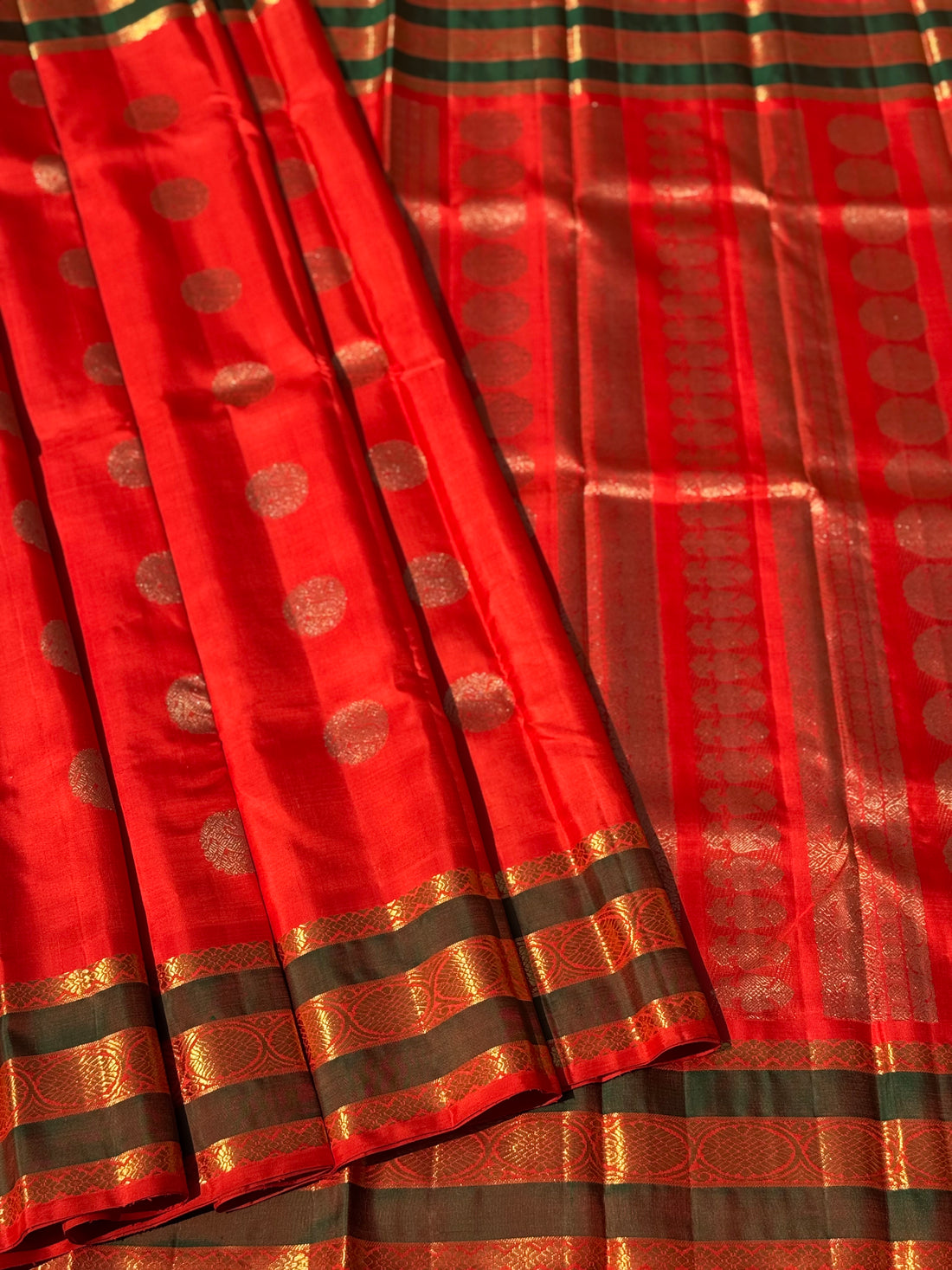 An exquisite zari woven bridal red kanchivaram masterpiece