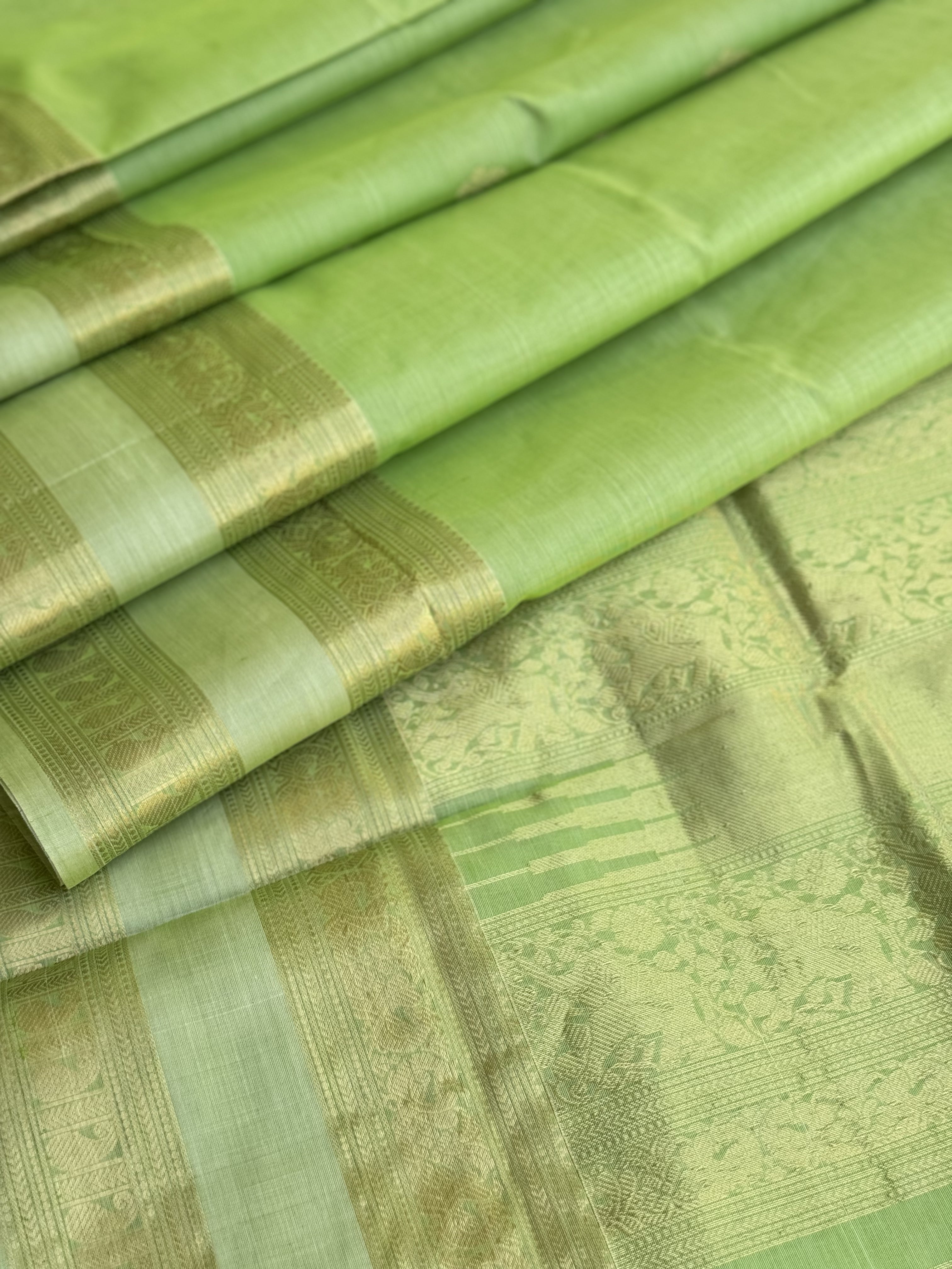 A gorgeous Chartreuse green kanchi silk cotton saree