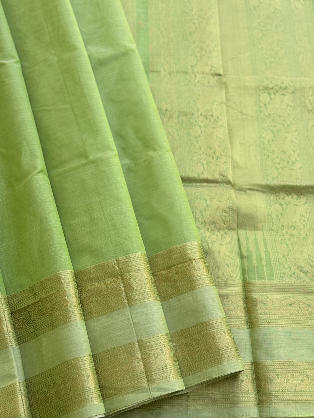 A gorgeous Chartreuse green kanchi silk cotton saree