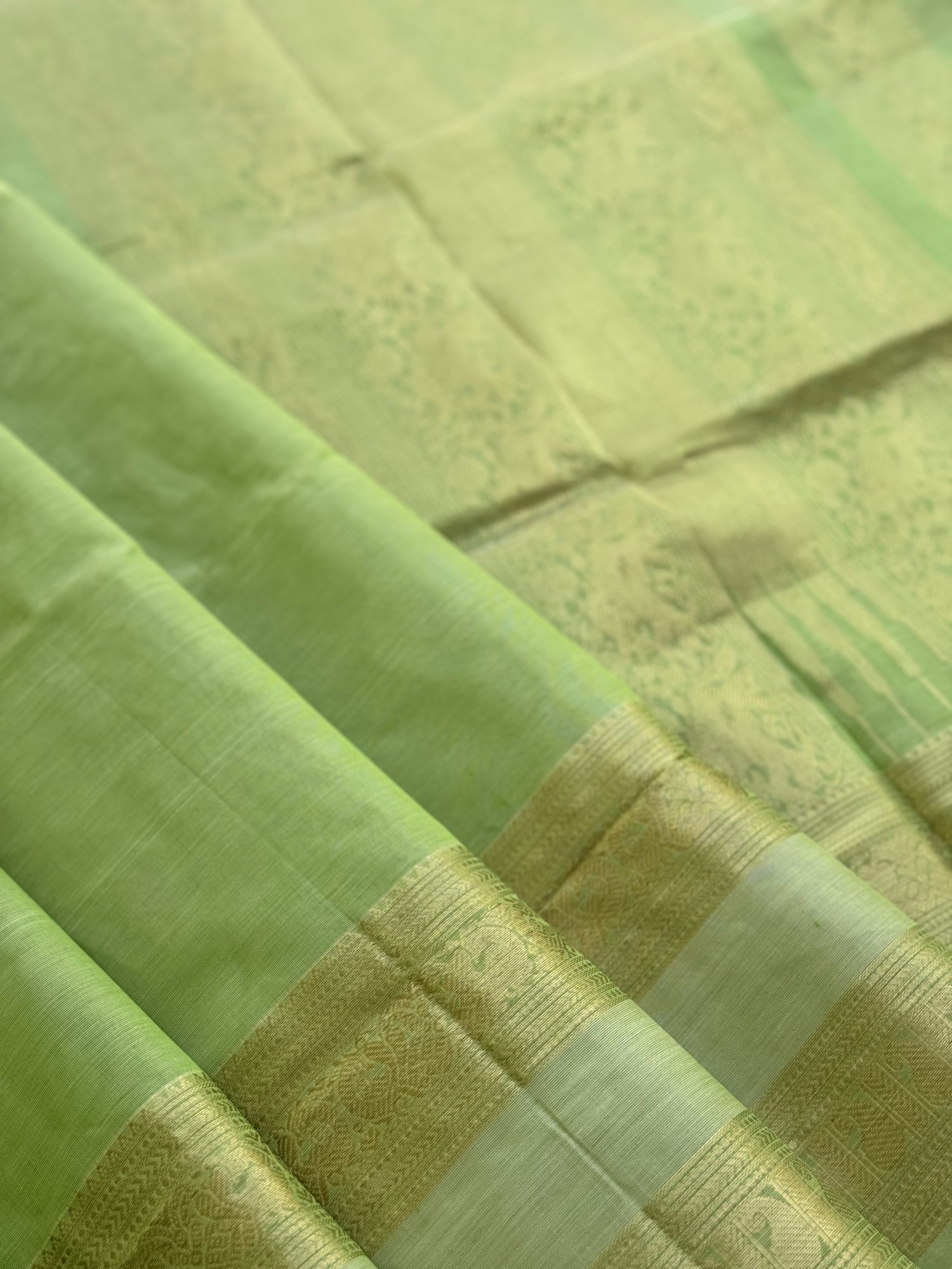 A gorgeous Chartreuse green kanchi silk cotton saree