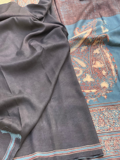 A double layered / double resist Handblock printed Ajrakh on heavy silk saree