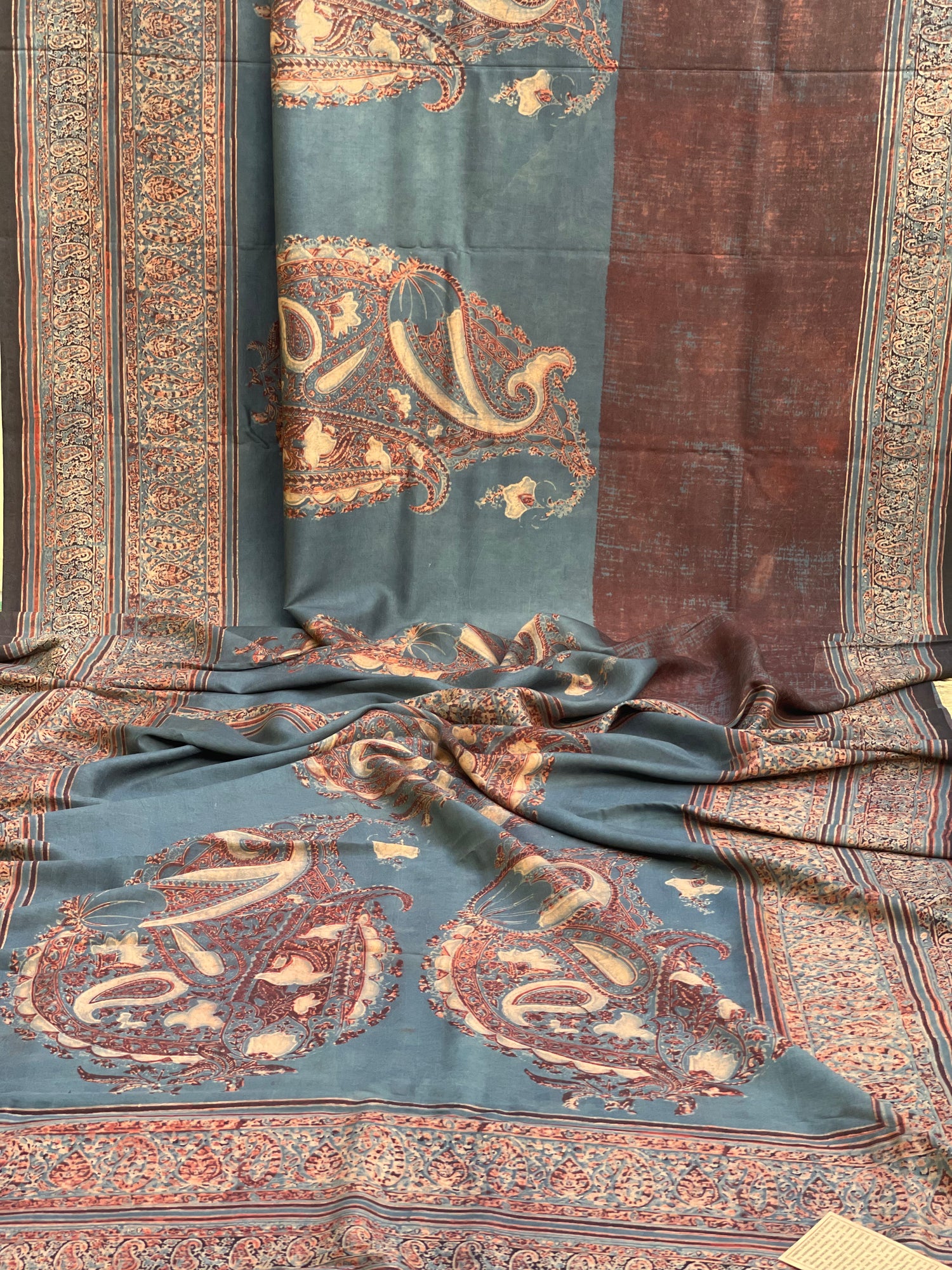 A double layered / double resist Handblock printed Ajrakh on heavy silk saree