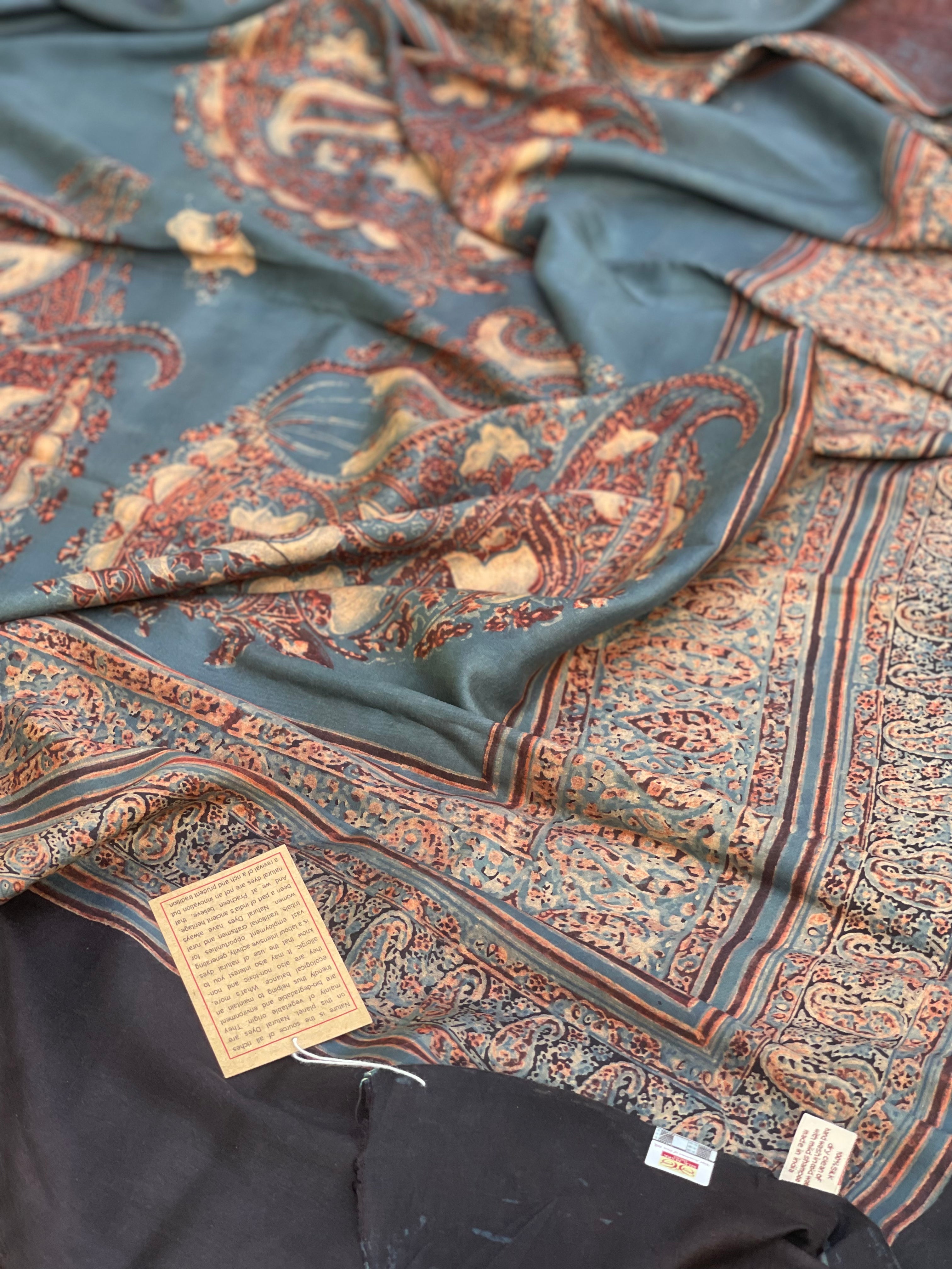 A double layered / double resist Handblock printed Ajrakh on heavy silk saree