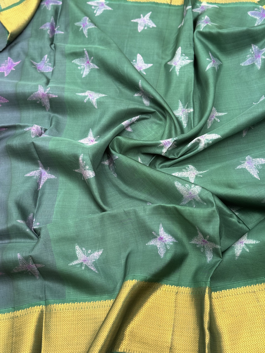 Bottle green shade NUI Shibori korvai kanchivaram silk saree