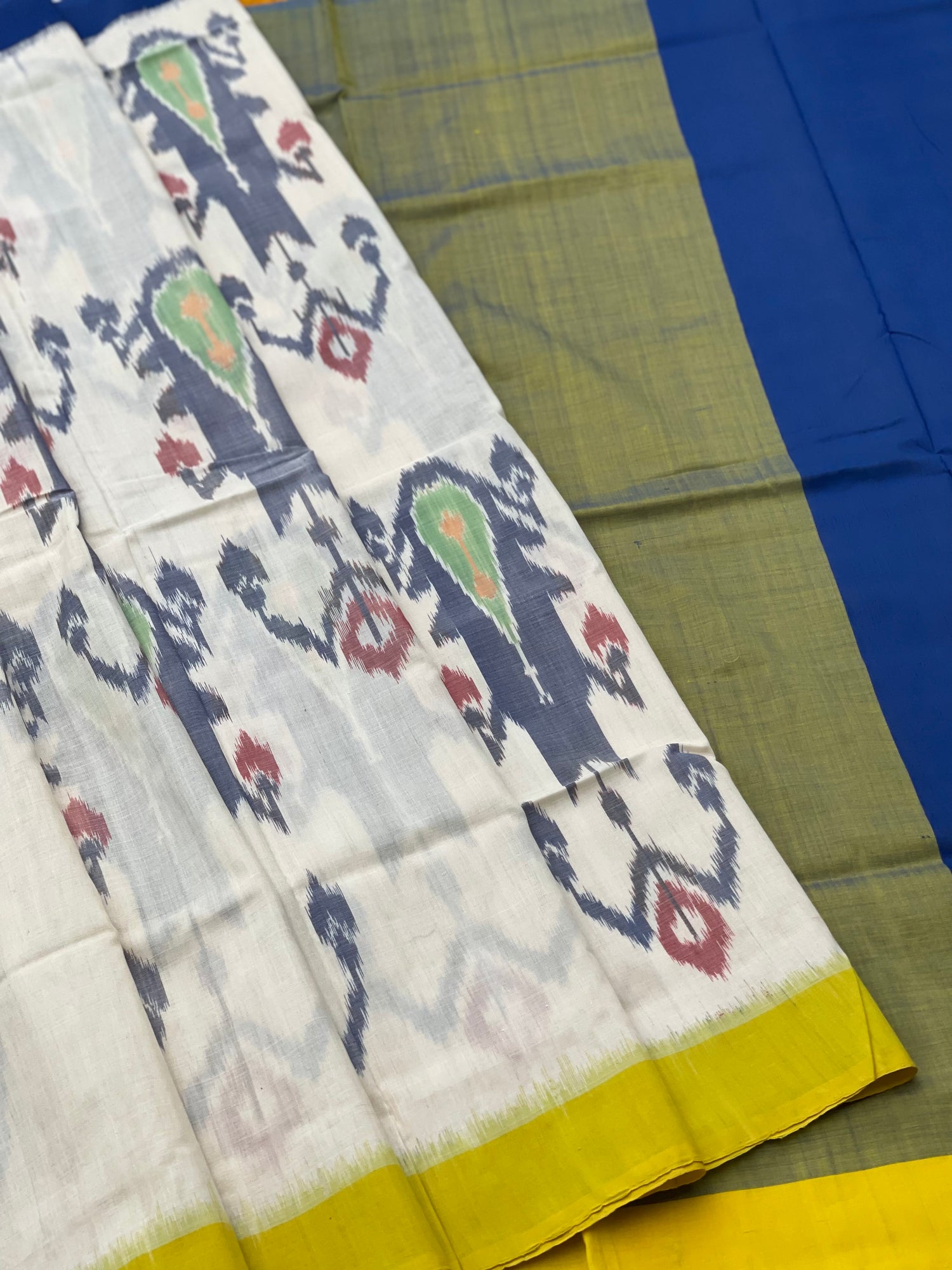 Weft Ikkat cotton  saree with Uzbek inspired motifs