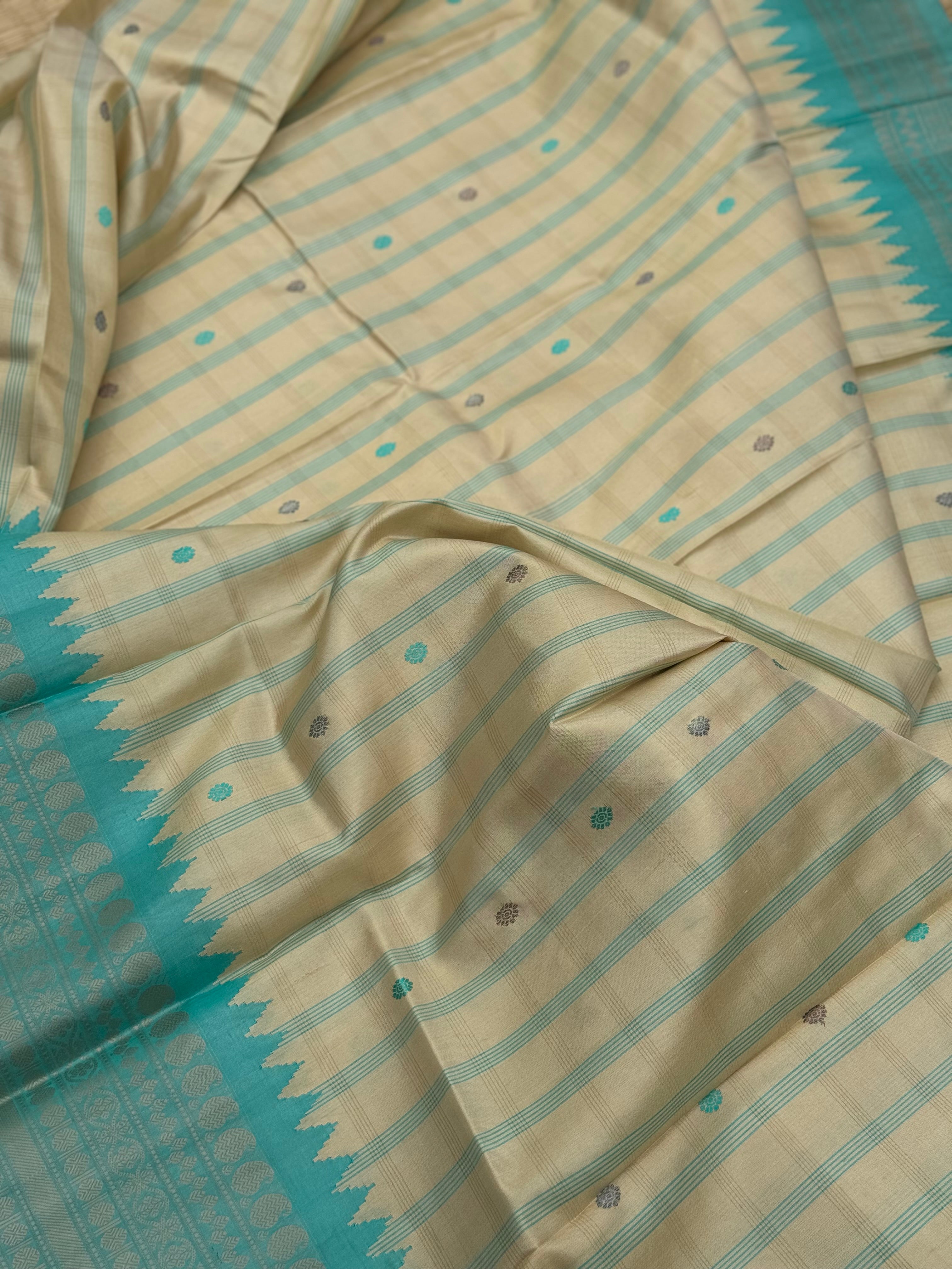 A gorgeous No Zari seagreen with ivory handwoven gadwal silk saree