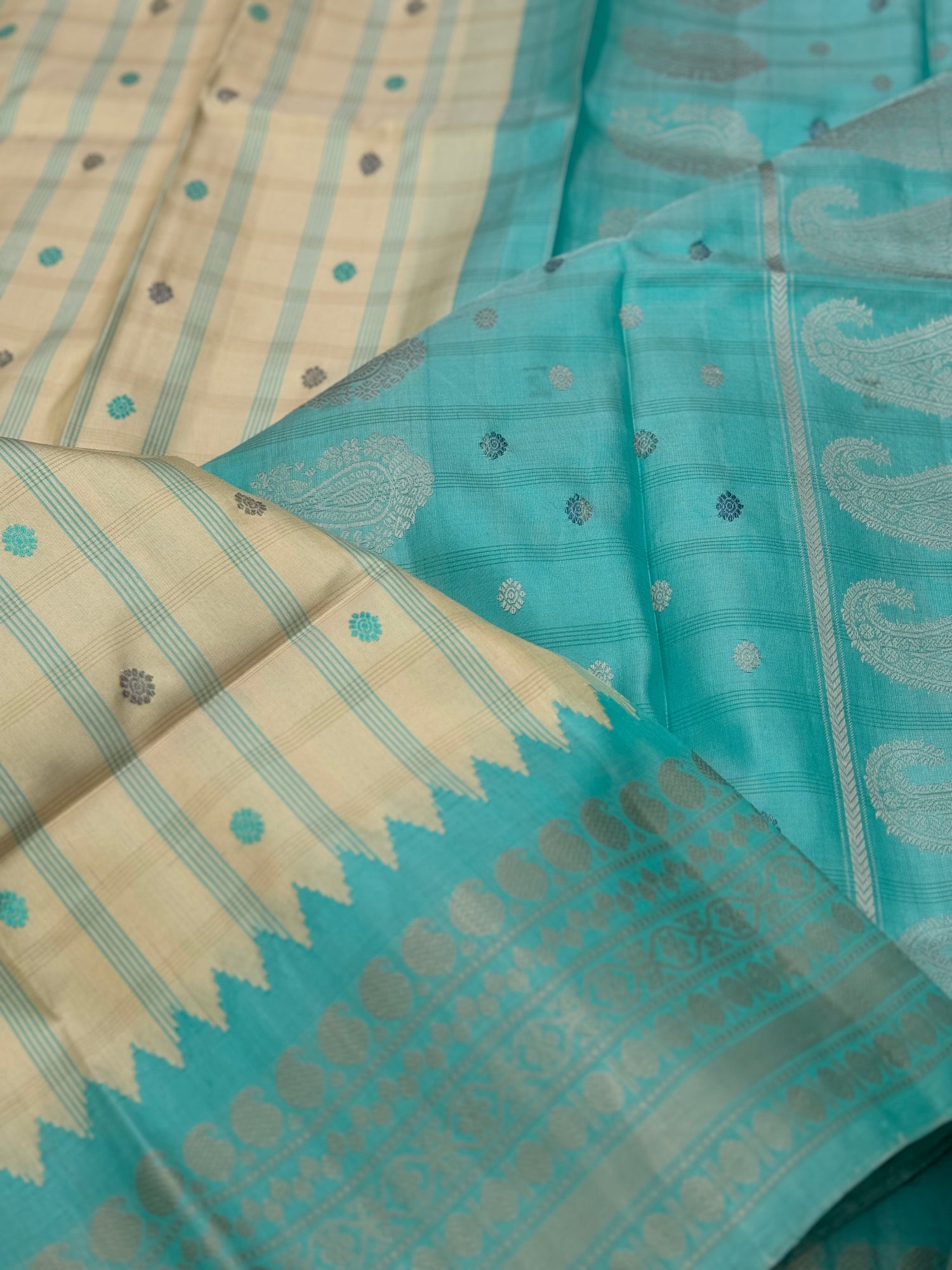 A gorgeous No Zari seagreen with ivory handwoven gadwal silk saree