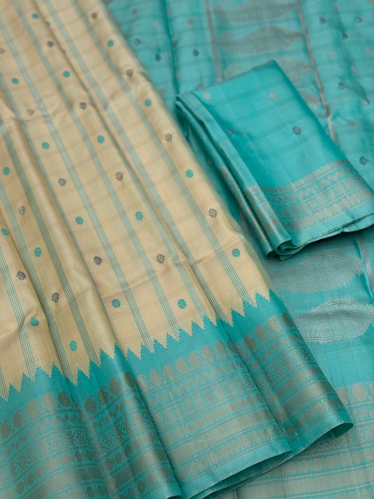 A gorgeous No Zari seagreen with ivory handwoven gadwal silk saree