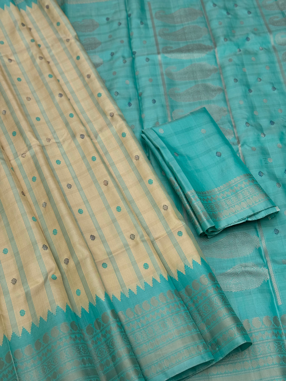 A gorgeous No Zari seagreen with ivory handwoven gadwal silk saree