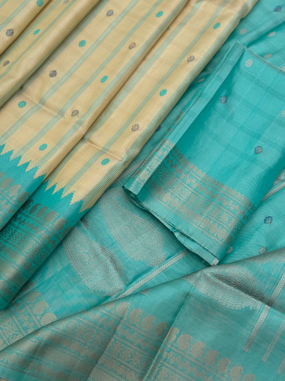 A gorgeous No Zari seagreen with ivory handwoven gadwal silk saree