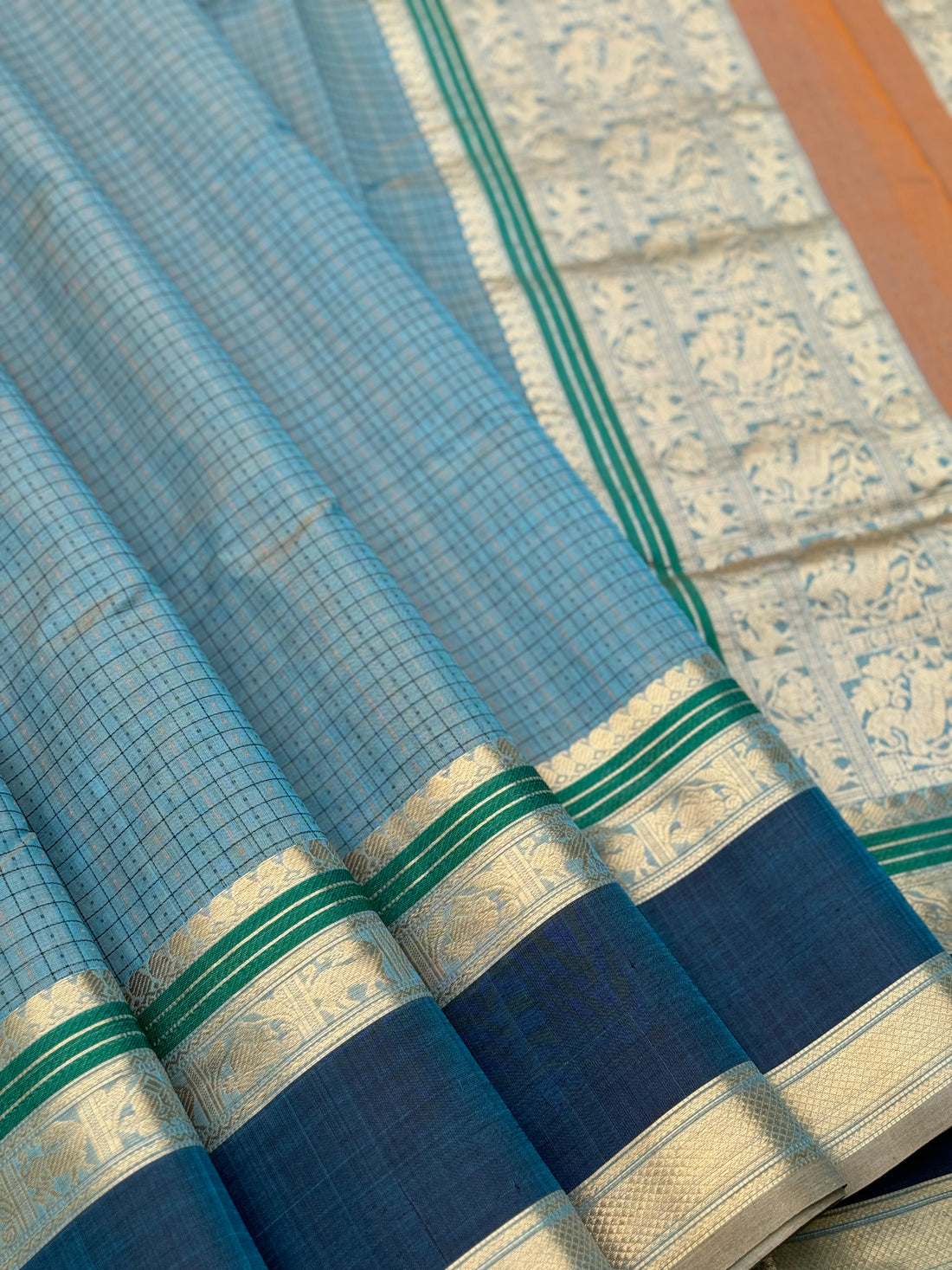 A gorgeous peacock blue shade handwoven lakshadeepam Kanchi silk cotton saree