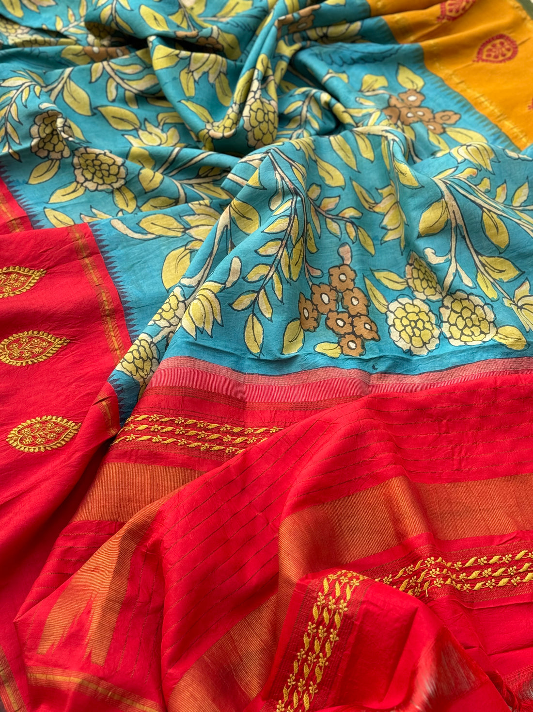 A korvai kanchivaram silk saree with penkalamkari and handmade chikankari embroidered work