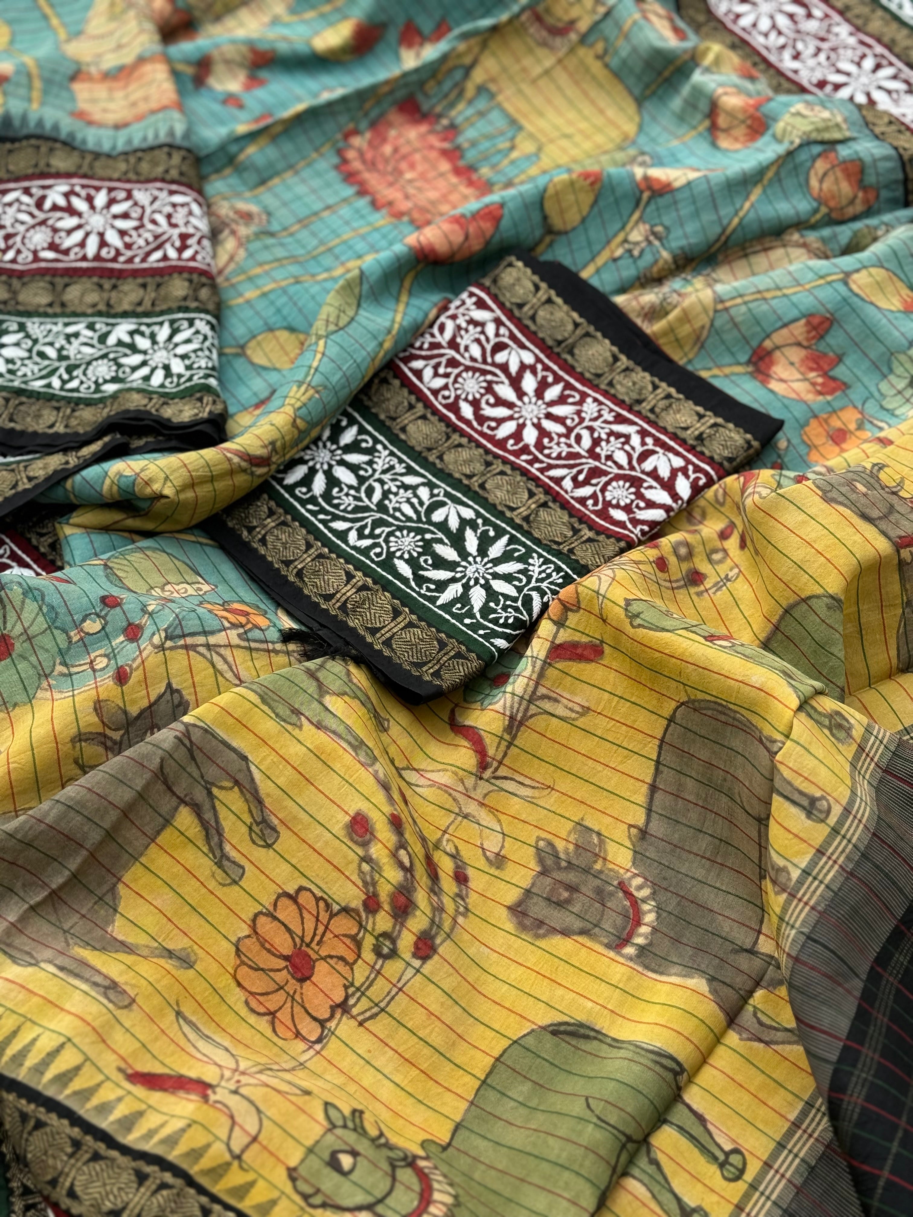 A korvai kanchivaram silk saree with penkalamkari and handmade chikankari embroidered work