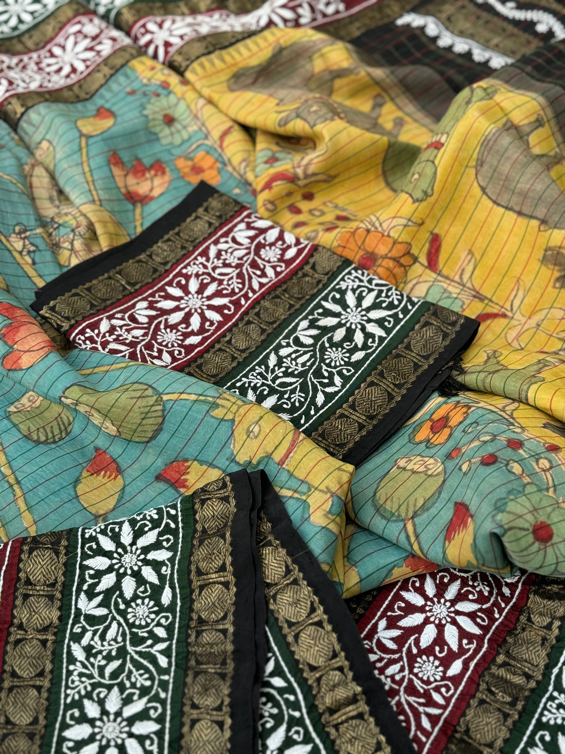 A korvai kanchivaram silk saree with penkalamkari and handmade chikankari embroidered work