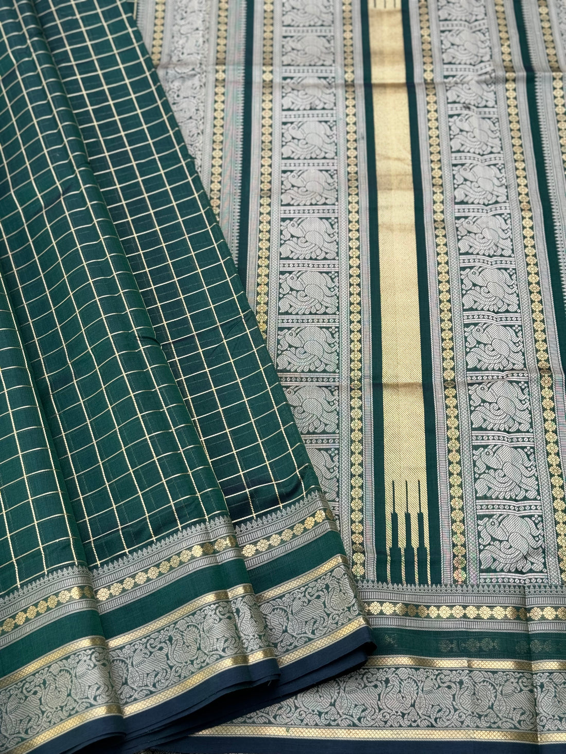 A gorgeous bottlegreen shade handwoven kattam Kanchi silk cotton saree