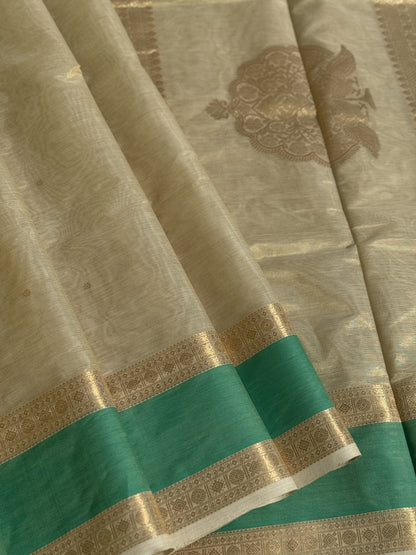 A gorgeous ivory gold shade handwoven Kanchi  silk cotton saree